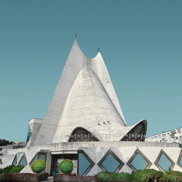 a view of a building with a large triangular shape on top of it