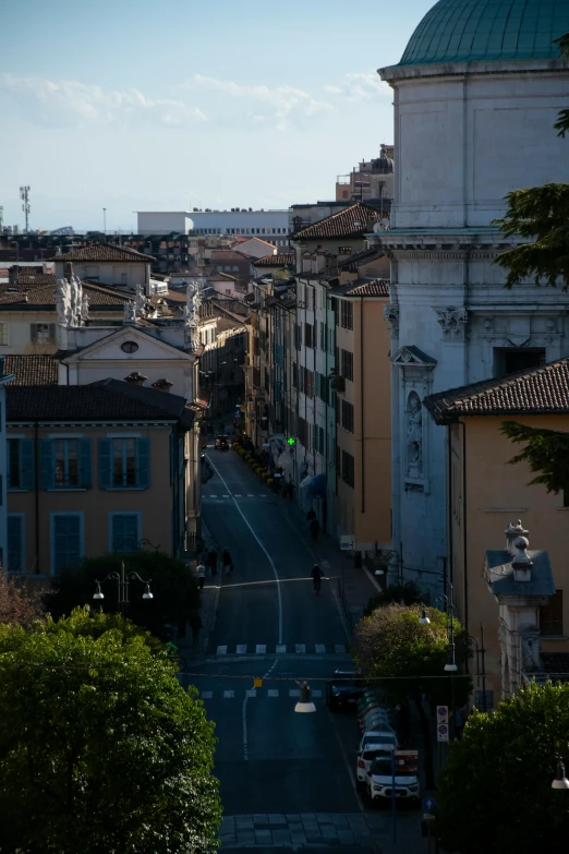 a street in front of a row of buildings