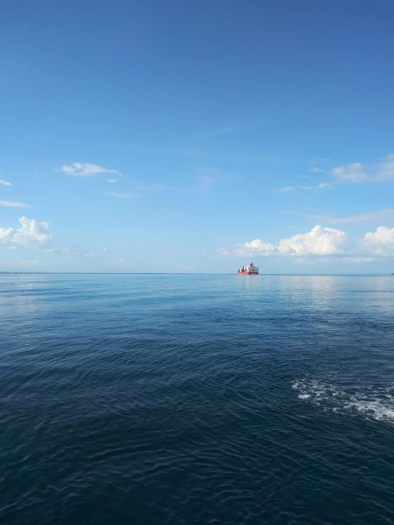 a boat is out in the open water