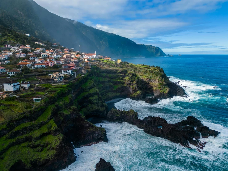 the coast line and houses on the water