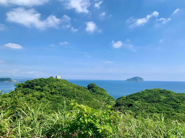 a landscape view with an island in the distance