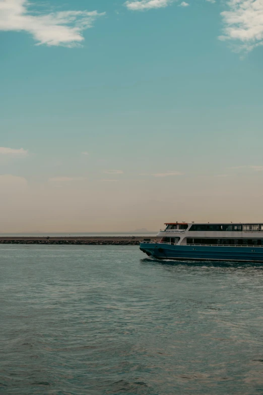 there is a long boat with several people on it