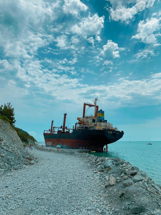 a large boat is anchored in the ocean