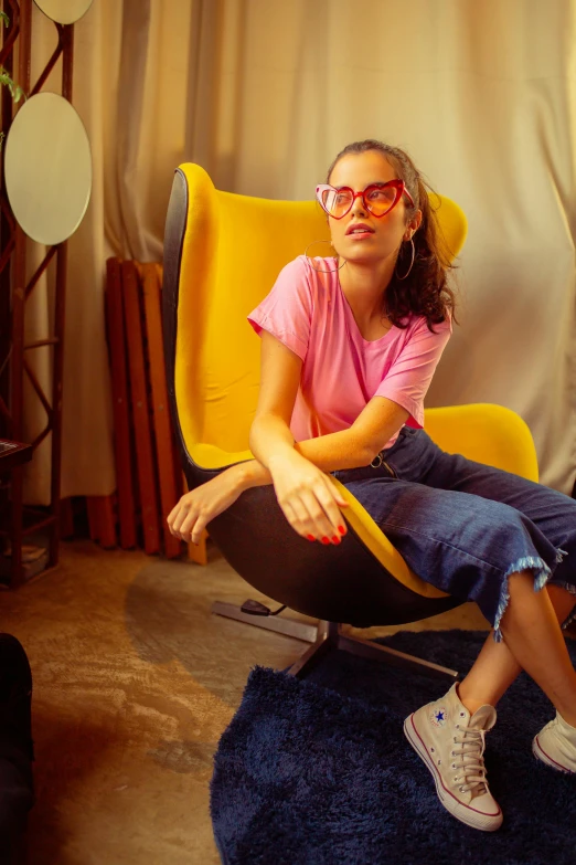 an image of a woman sitting in a chair