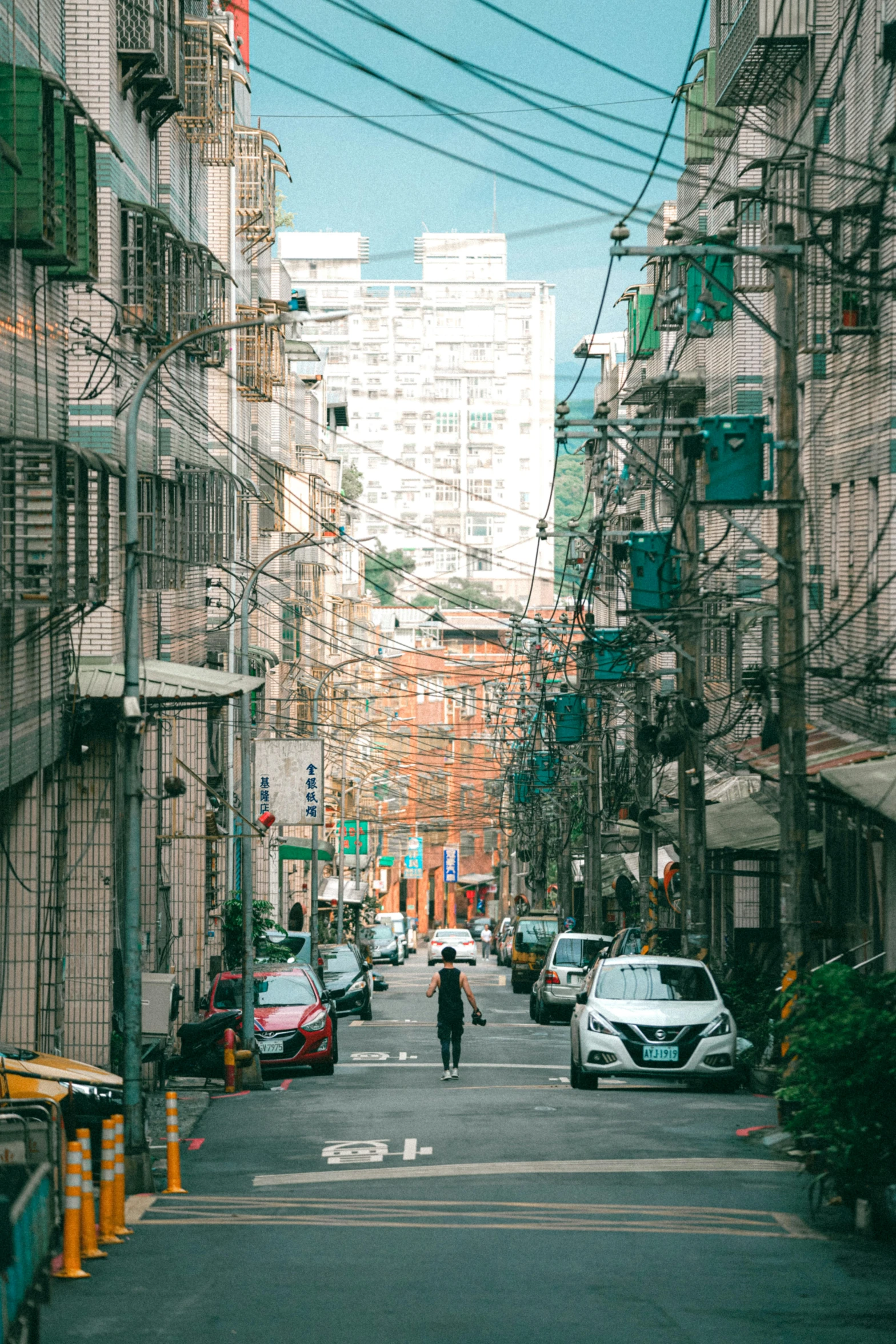 a man with an umbrella on the street