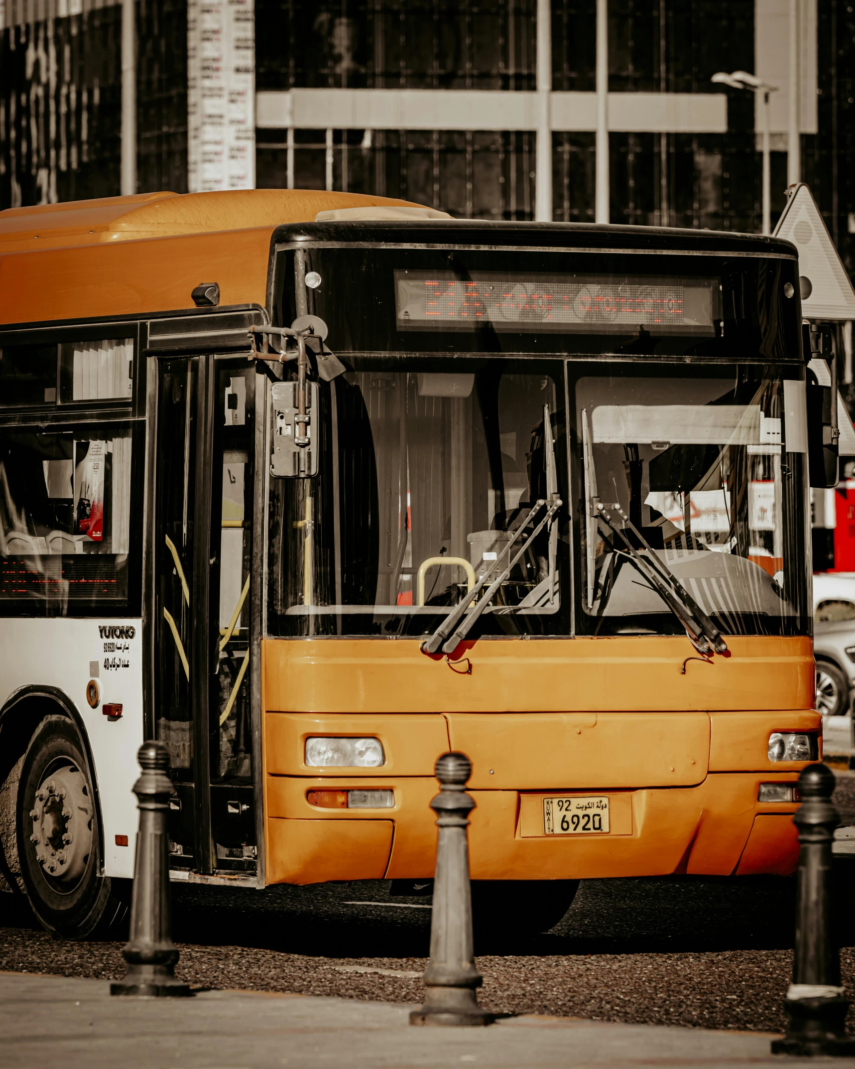 a close up of a city bus on a street