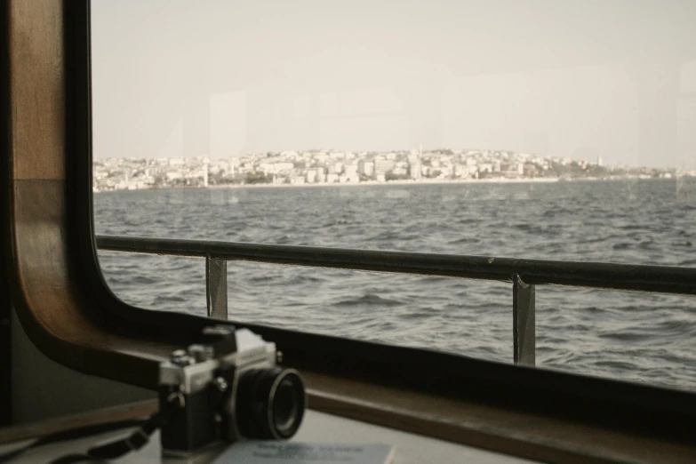 a view of the ocean as seen through a window