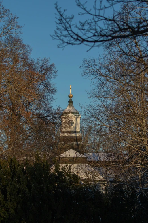 there is a clock tower that is located on the top of this building