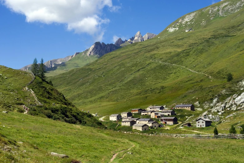 an alpine mountain resort is nestled within the valley