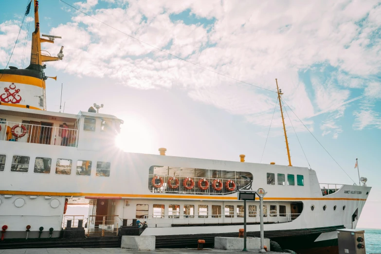 the boat is docked at the dock for passengers