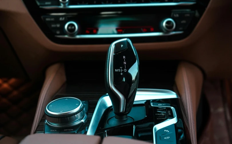 the car dashboard is equipped with electronics such as an mp3 player and a controller