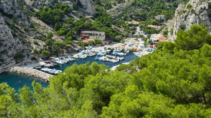 a marina on the banks of a mountainous hillside