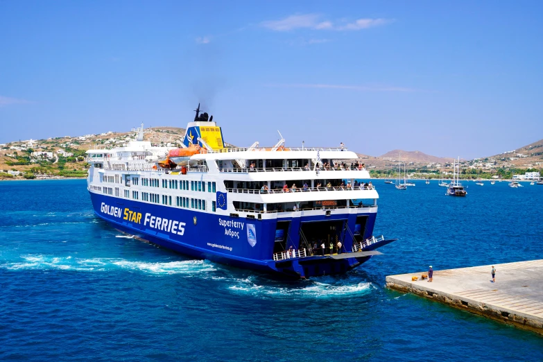 a large ferry boat is sailing into the harbor