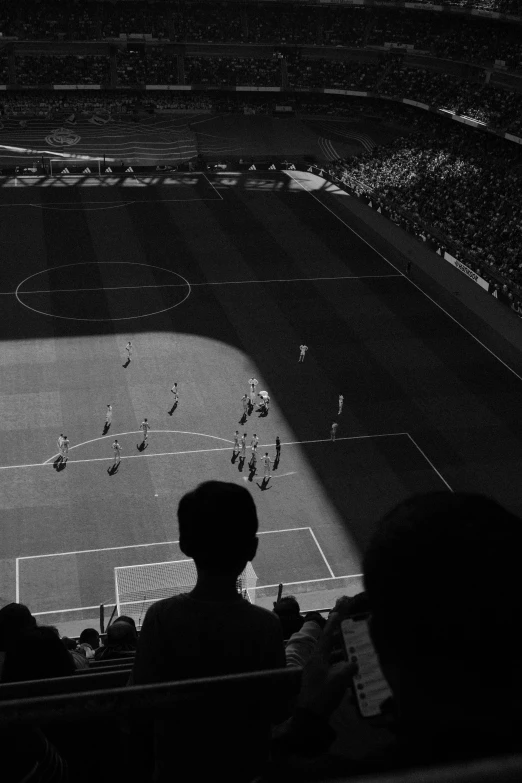 the back of a crowd at a stadium