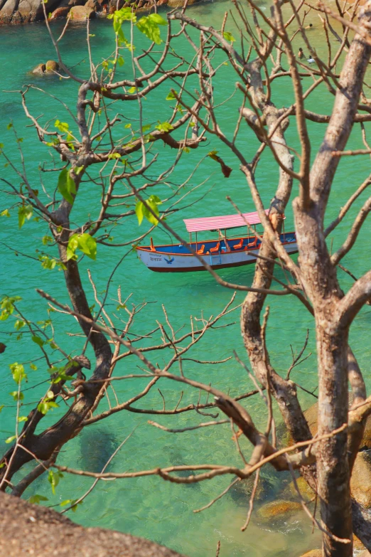 there is a boat in the clear water