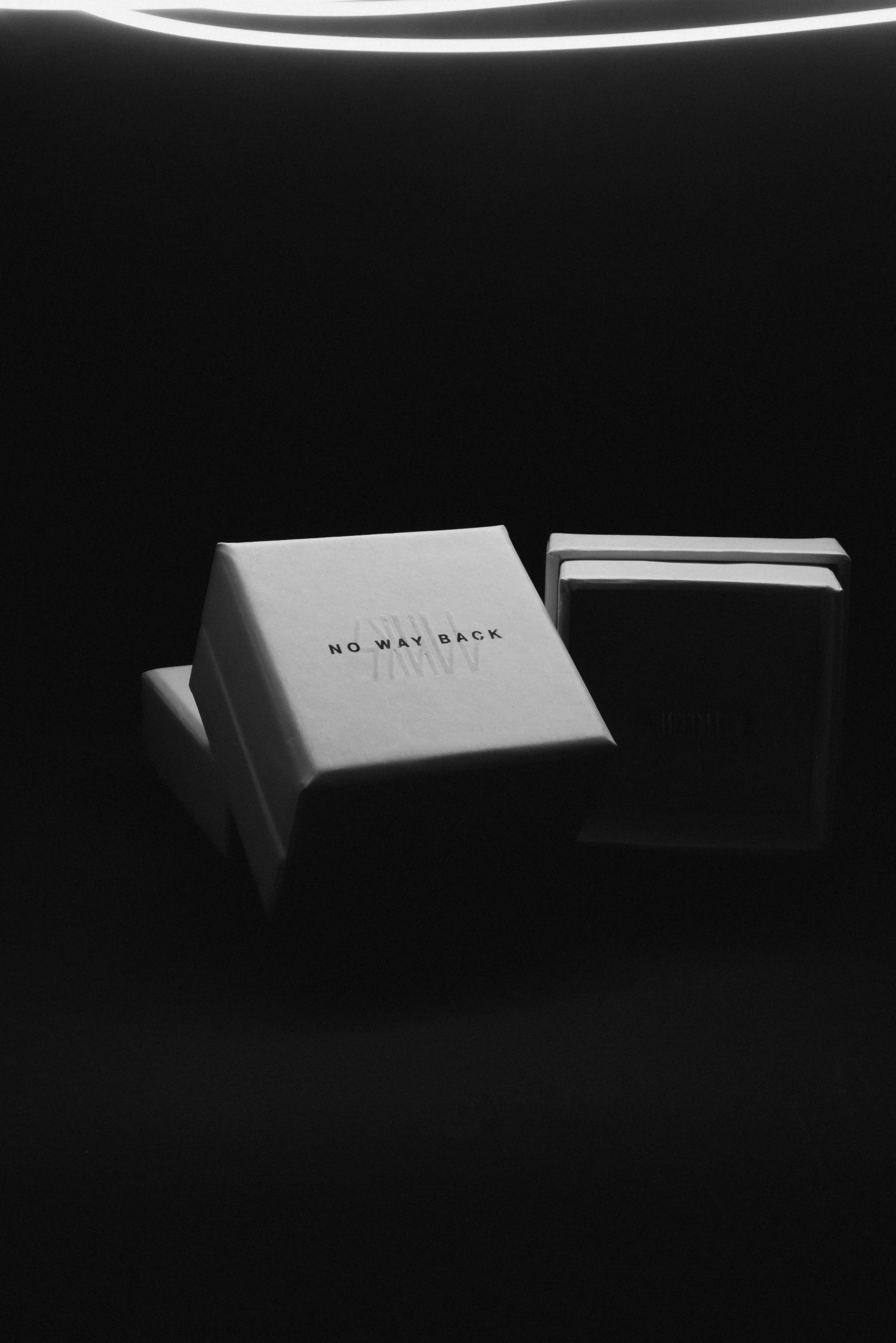 a po taken in black and white of three cards