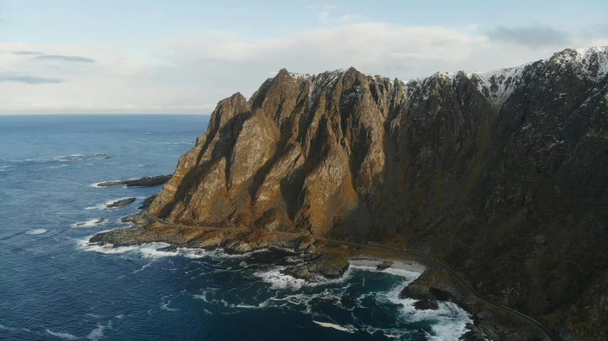 the aerial view of the coastline from a helicopter