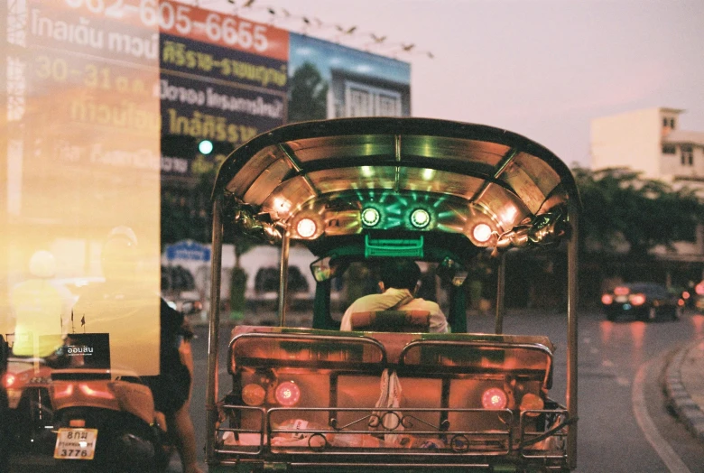 this is an image of a cart driving down the street