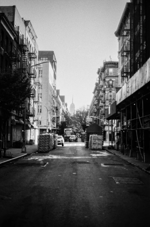 the empty streets of an urban area are surrounded by construction