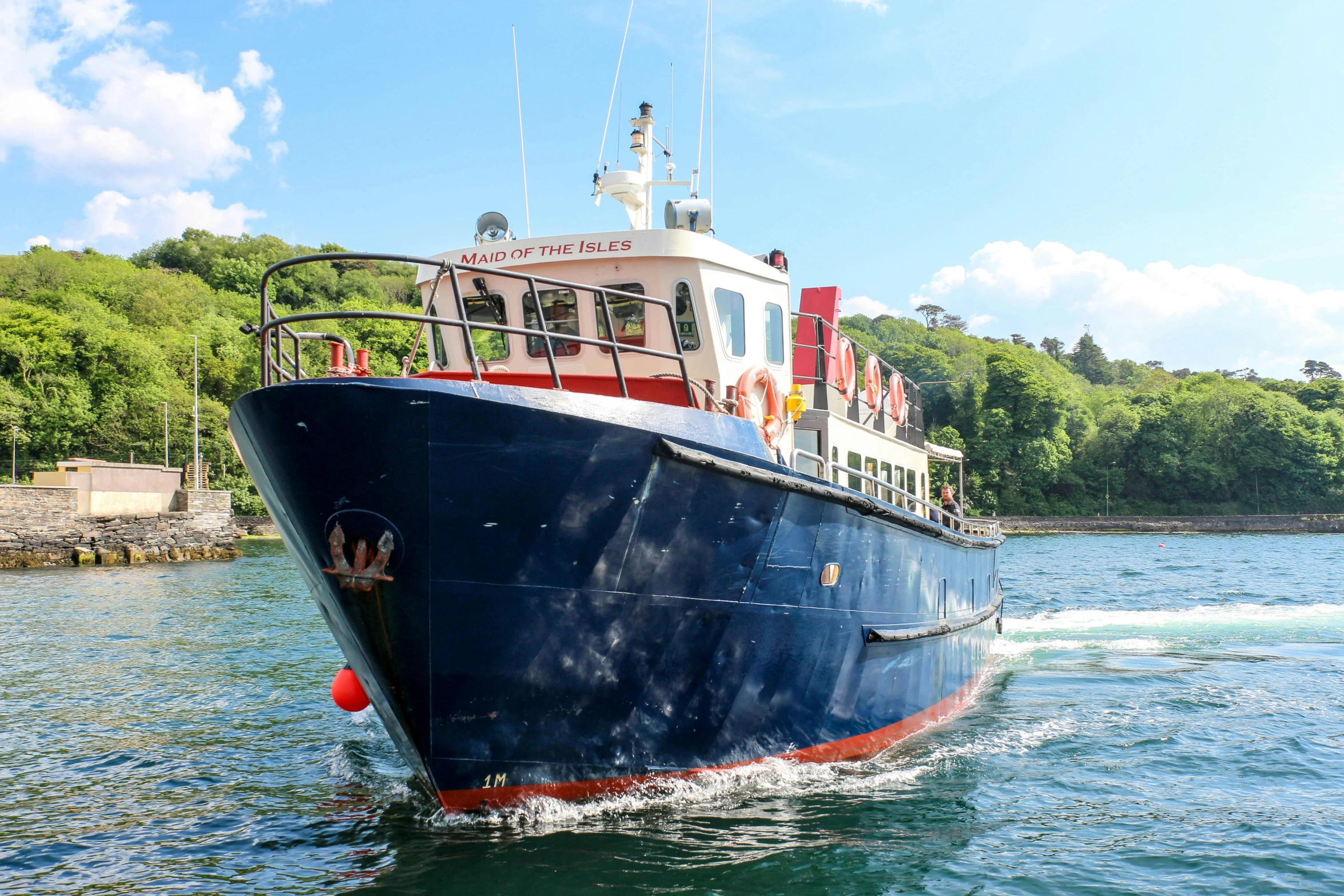 a large boat traveling on the ocean water