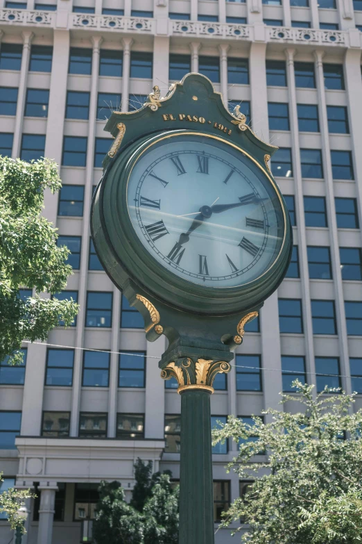 there is a large clock on the street