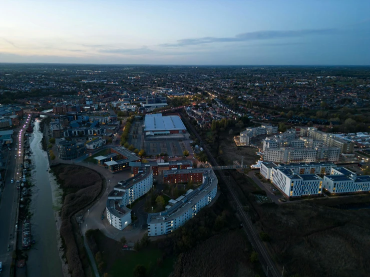 the aerial view shows several large buildings next to each other