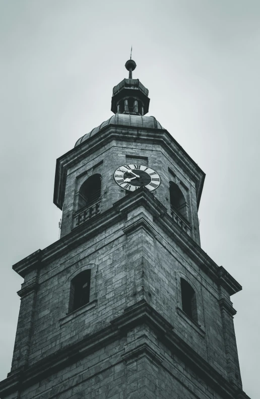 a black and white po of a clock tower