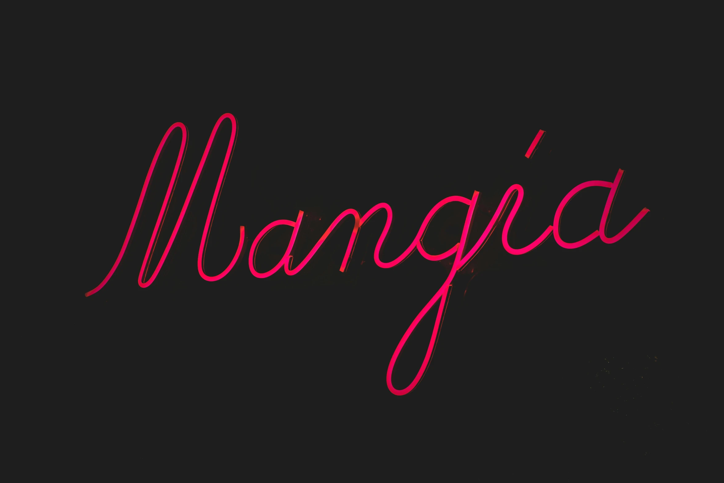 the word mangai is in red and has black background