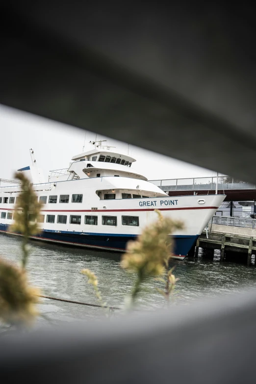 the yacht is parked next to the dock