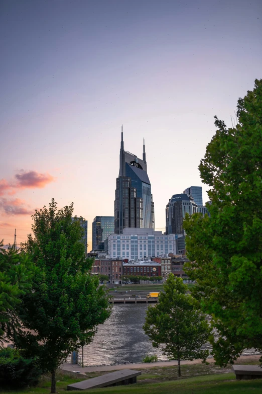 a city skyline with a river running through it