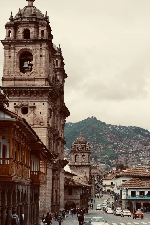 a clock tower is in the middle of a town