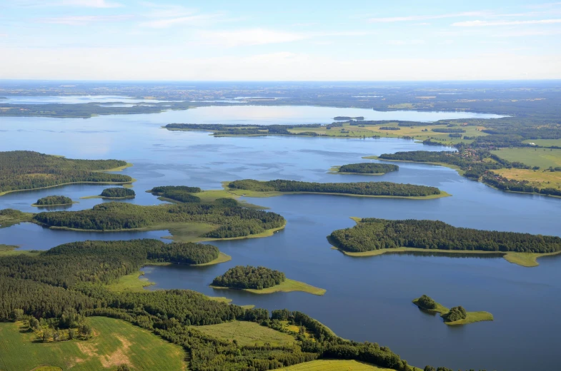 an aerial view of a lake in the middle of nowhere