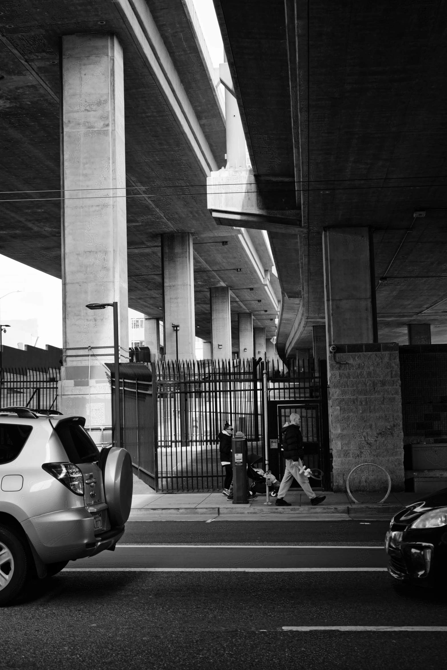 a very long bridge overpass over a freeway