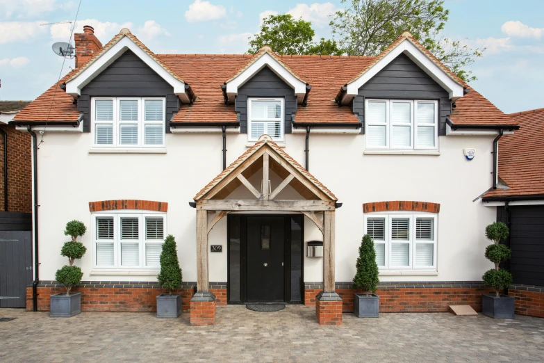 an image of a house with landscaping in front