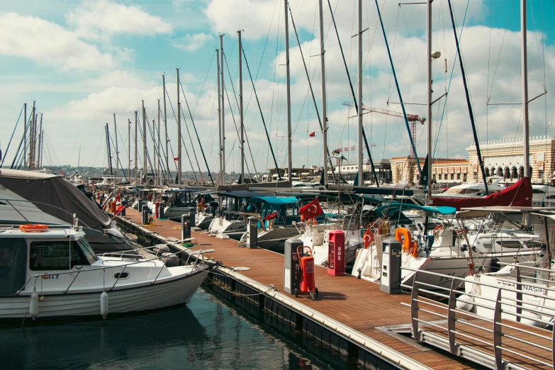 there is a dock with sailboats in it