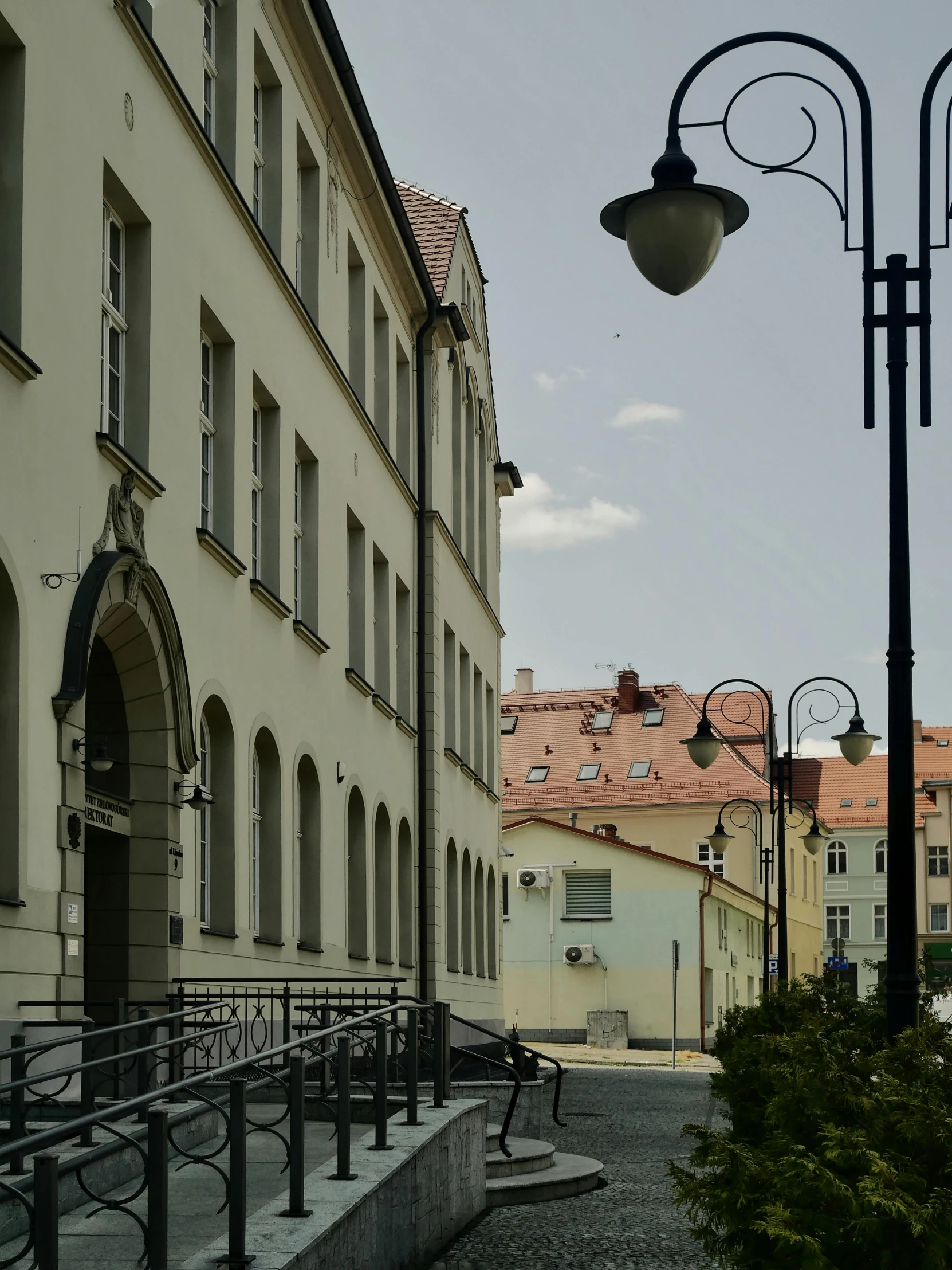 an older building with lots of windows and lights on