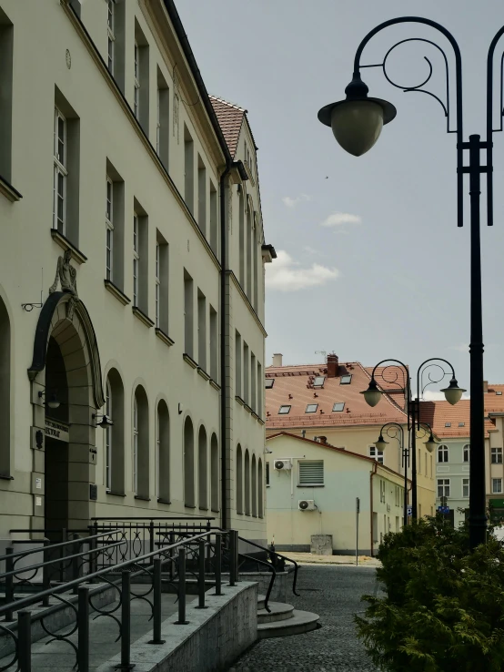 an older building with lots of windows and lights on