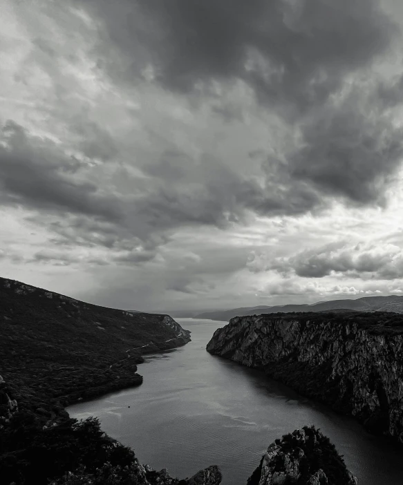 a long view of the mountains and the water