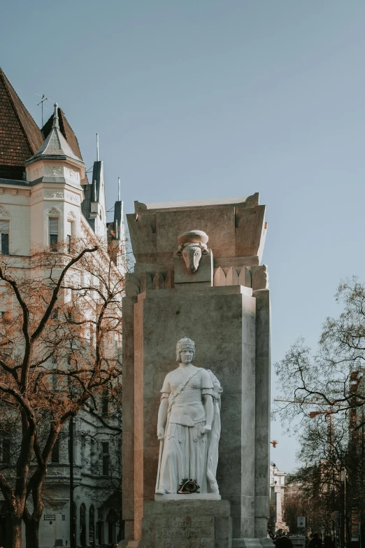 the monument is decorated with an image of the pope