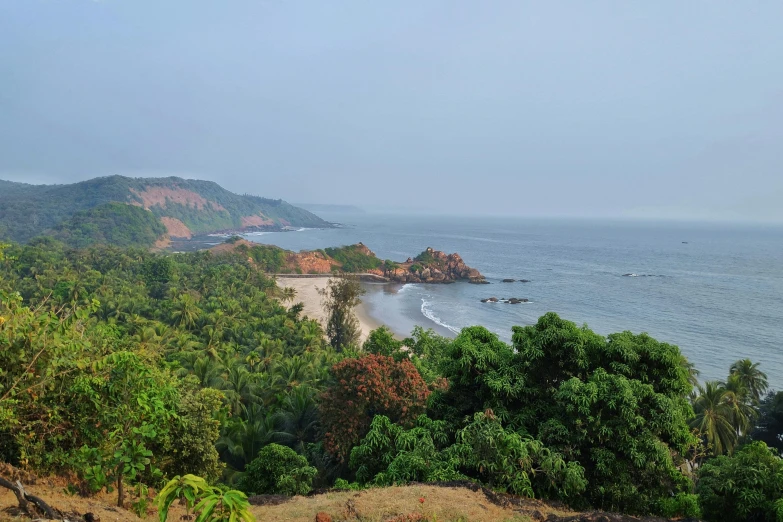 the view from top of a mountain with sea in back