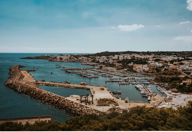 a small island with lots of boats on the water