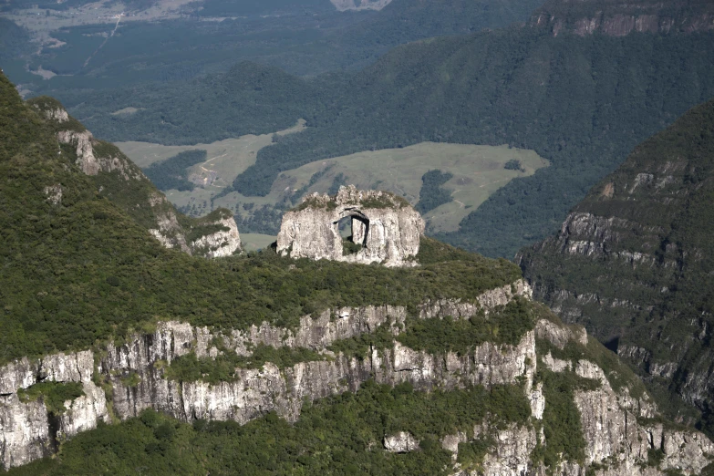 the remains of the church on top of a mountain overlooking the valley