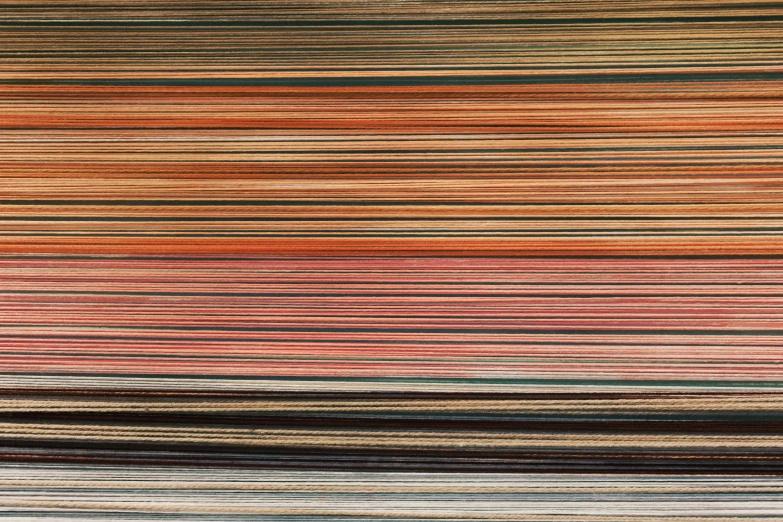 colorful striped rug with one large and one small