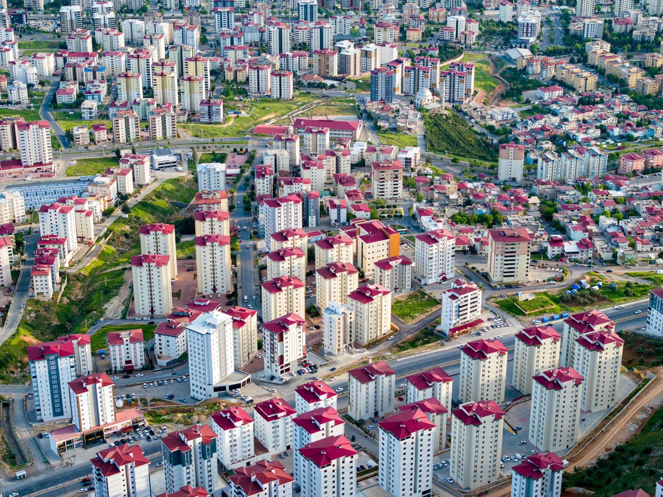 an aerial view of a city surrounded by tall buildings