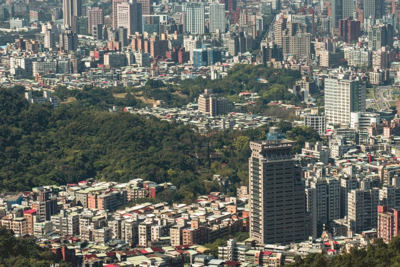 a bunch of buildings with trees in the back