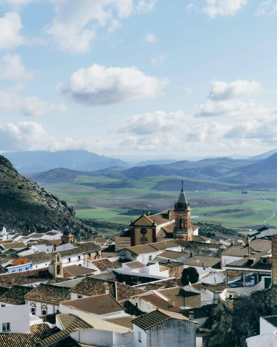 a town with mountains in the background