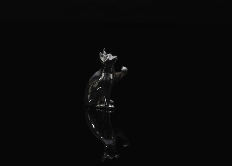 black and white pograph of a glass figurine