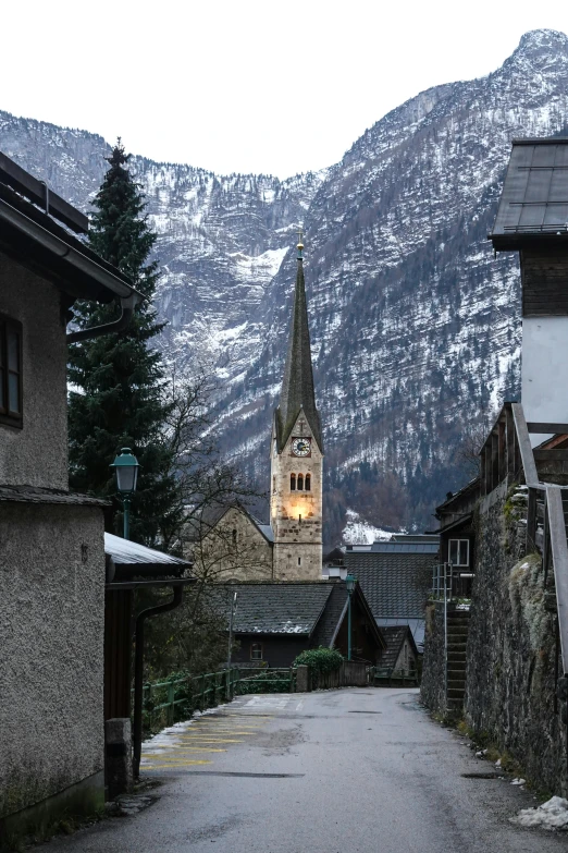 a street with some houses near mountains