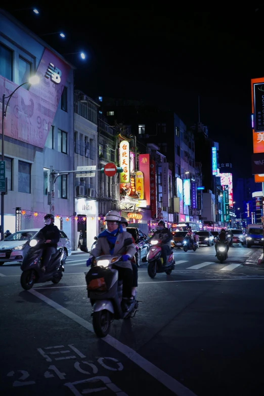 there are several motorcyclists on the streets of a city