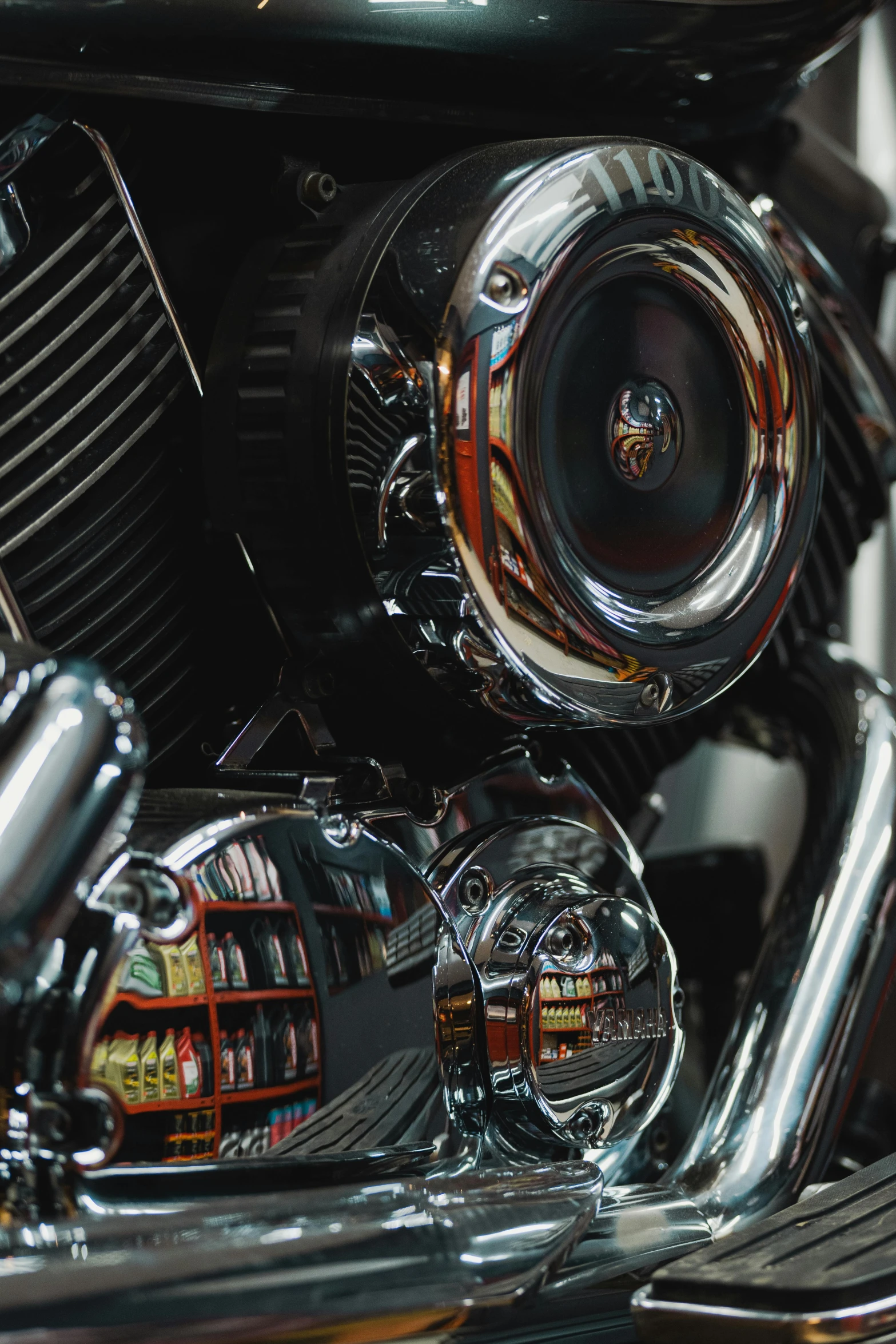 the front and side view of a chrome motorcycle